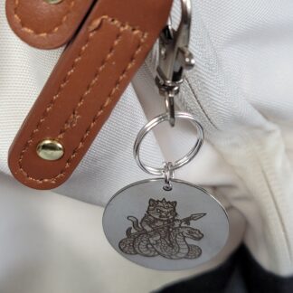Master Henry and his Serpent Steed – Laser Engraved Adventure Cat Keychain Fob