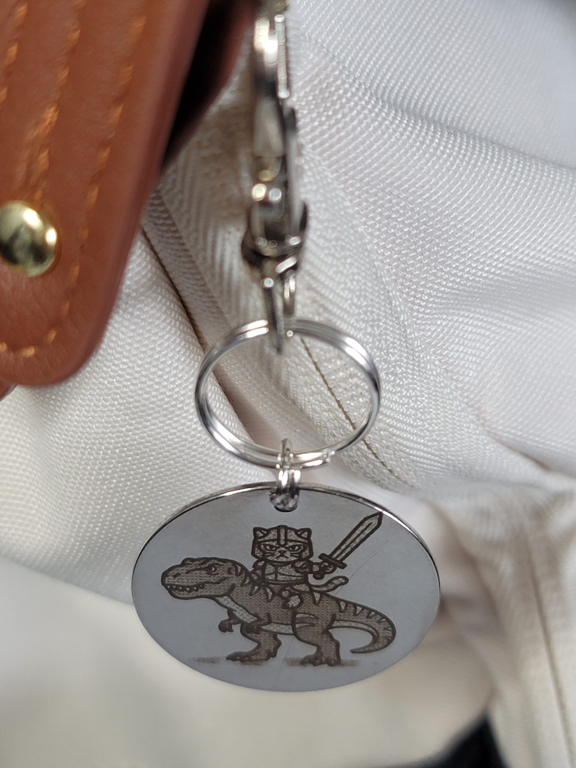 Captain Muffin Rides a T-Rex – Laser Engraved Adventure Cat Keychain Fob